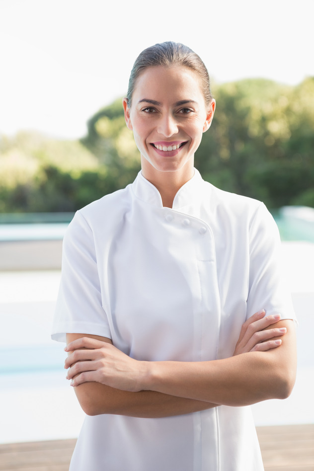 terapia bowen photodune 8600058 smiling beauty therapist looking at camera outside at the spa s